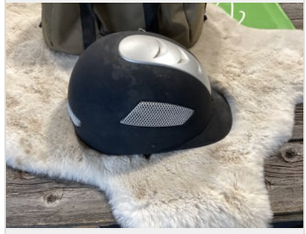 Helmet and Ariat Bag 6 7/8