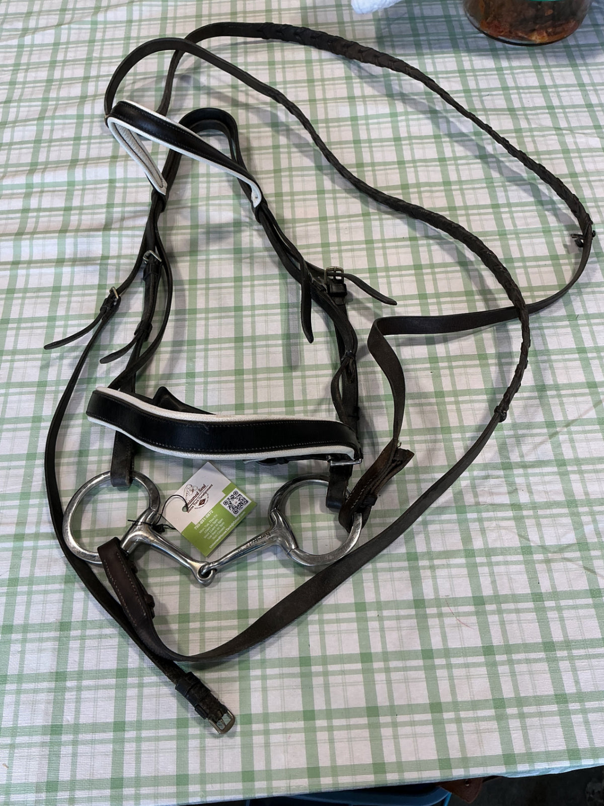 english bridle black leather with bit and reins attached 