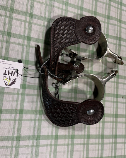 spurs with leather straps 
