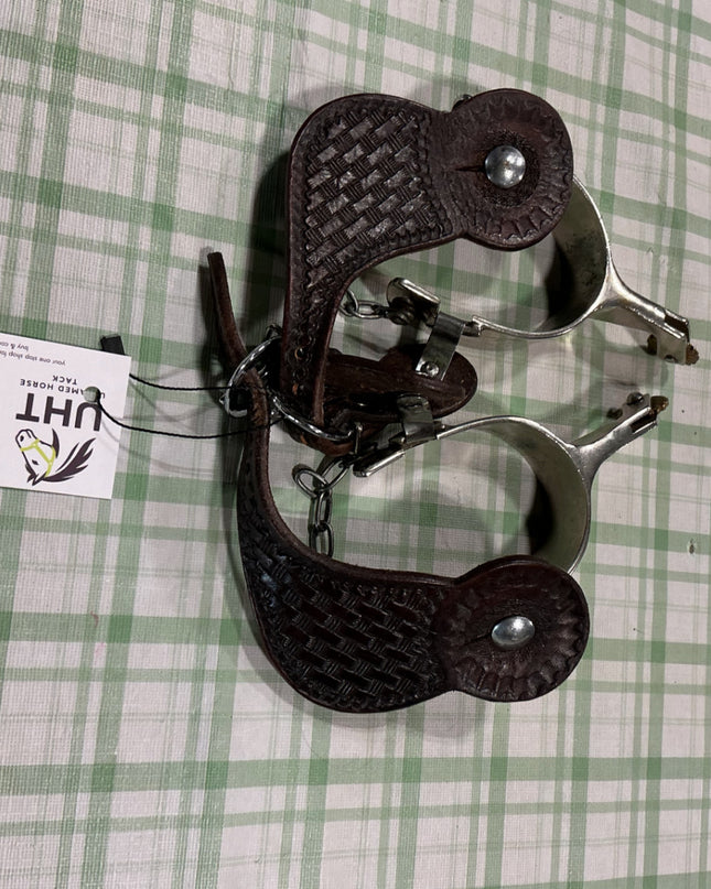 spurs with leather straps 