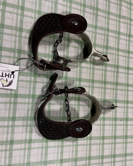 spurs with leather straps 
