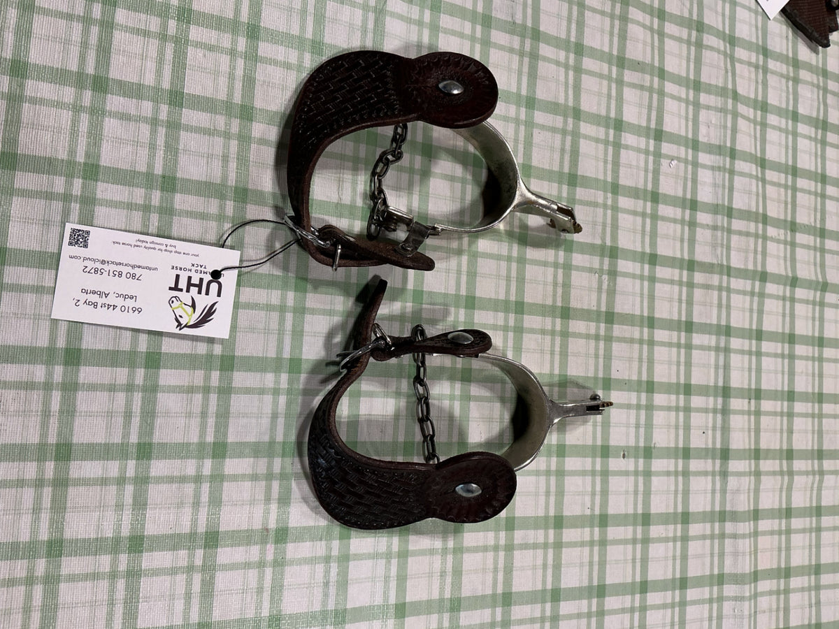 spurs with leather straps