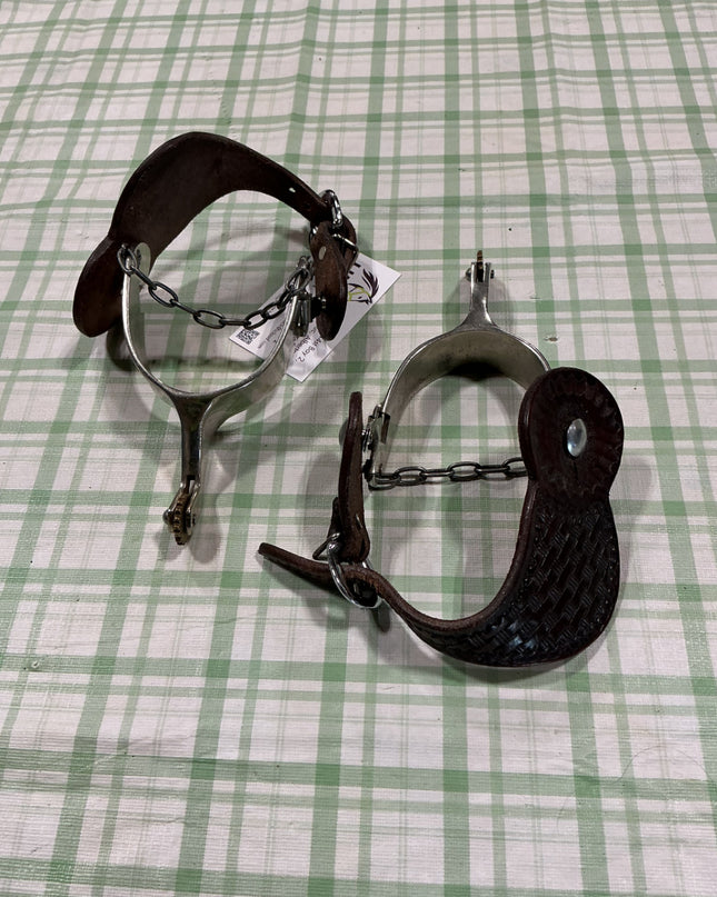 spurs with leather straps 