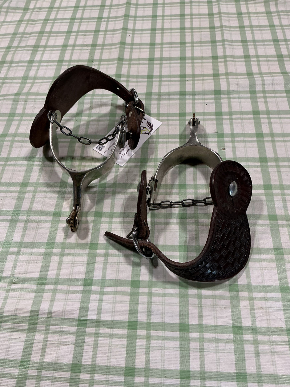 spurs with leather straps