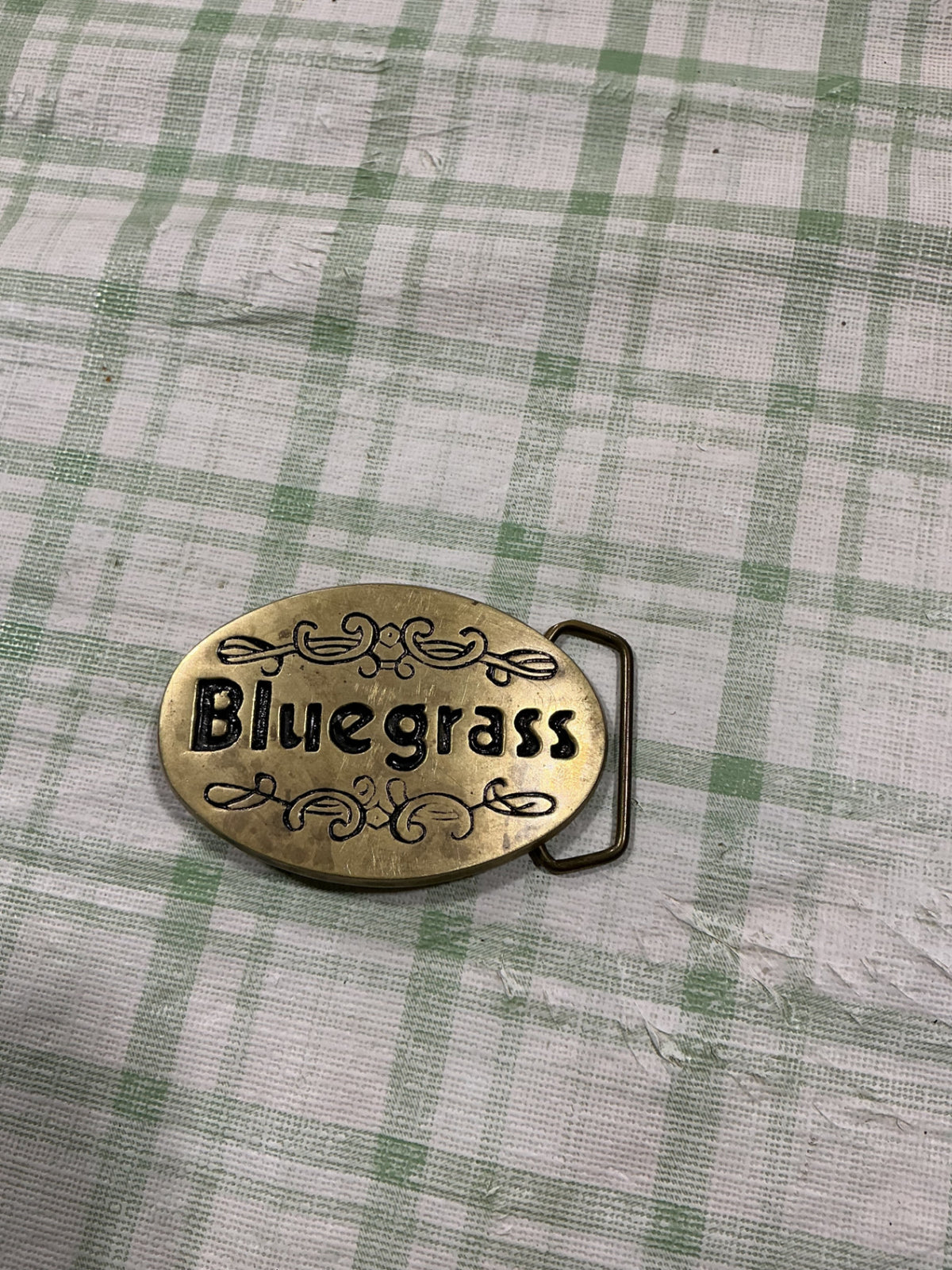 belt buckle blue grass