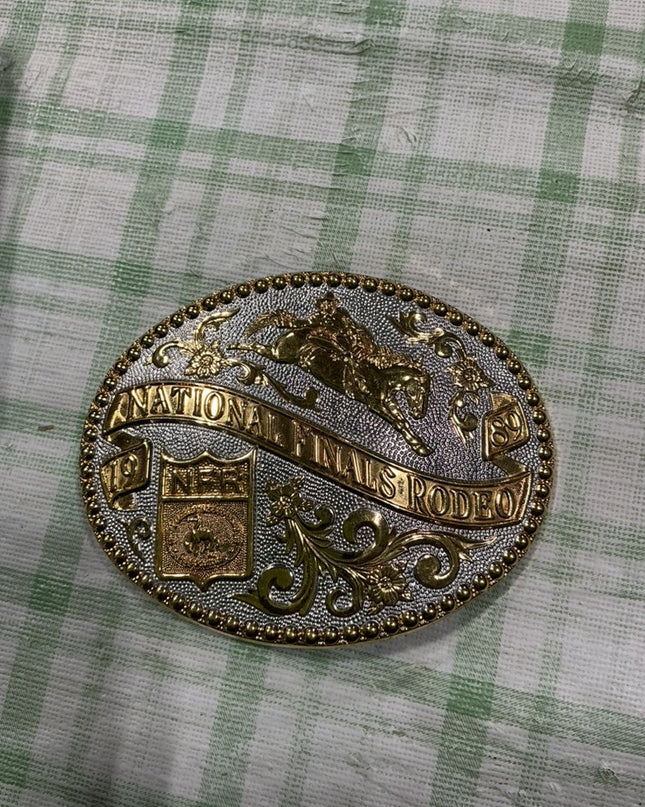 belt buckle gold bronc