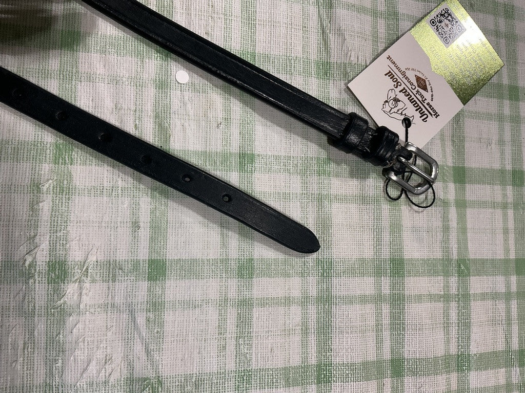 throat latch extra leather on it 