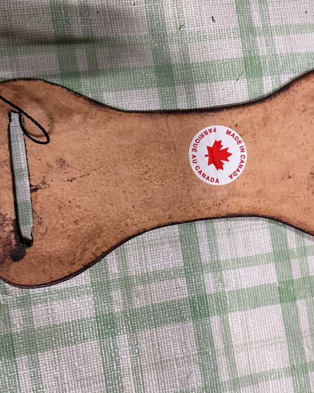 leather cinch or rope keeper 