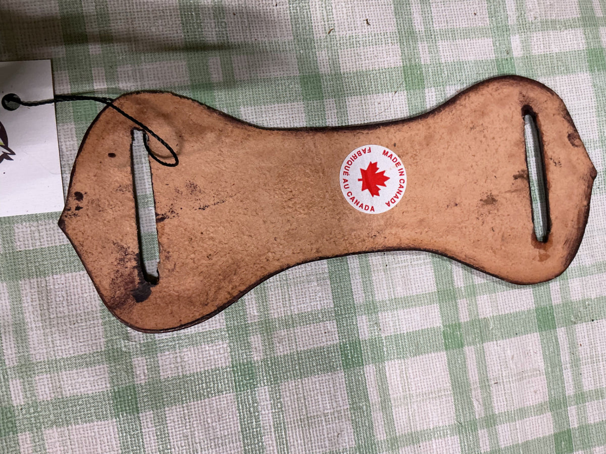 leather cinch or rope keeper 