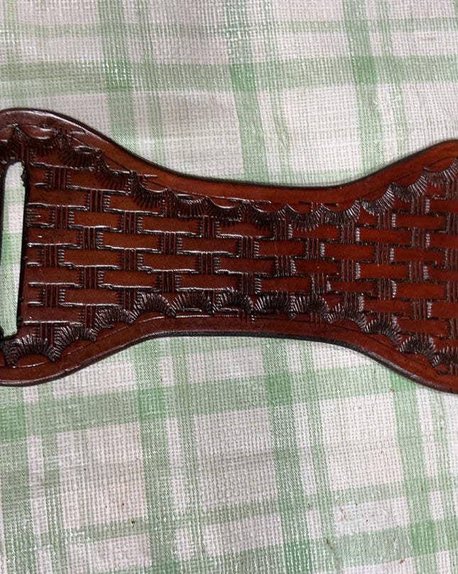 leather cinch or rope keeper 