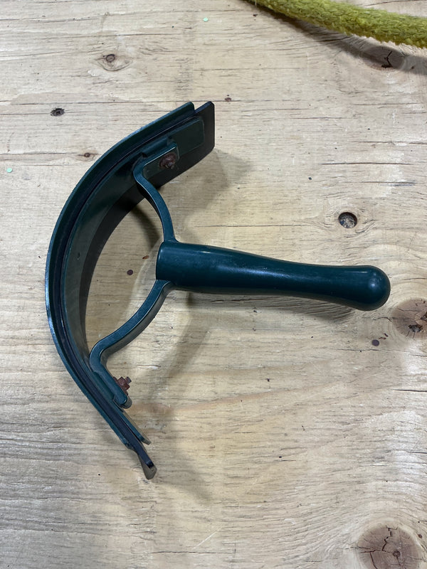 Sweat Scraper (Rust on Metal) | Used